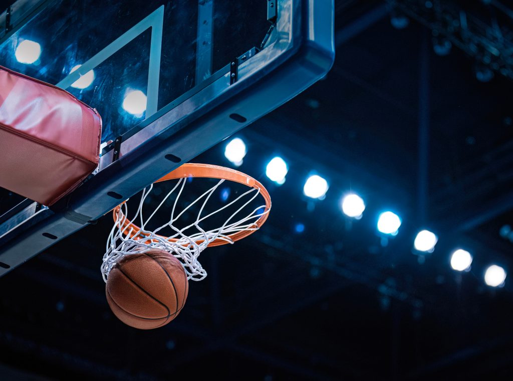 Basketball going through the hoop